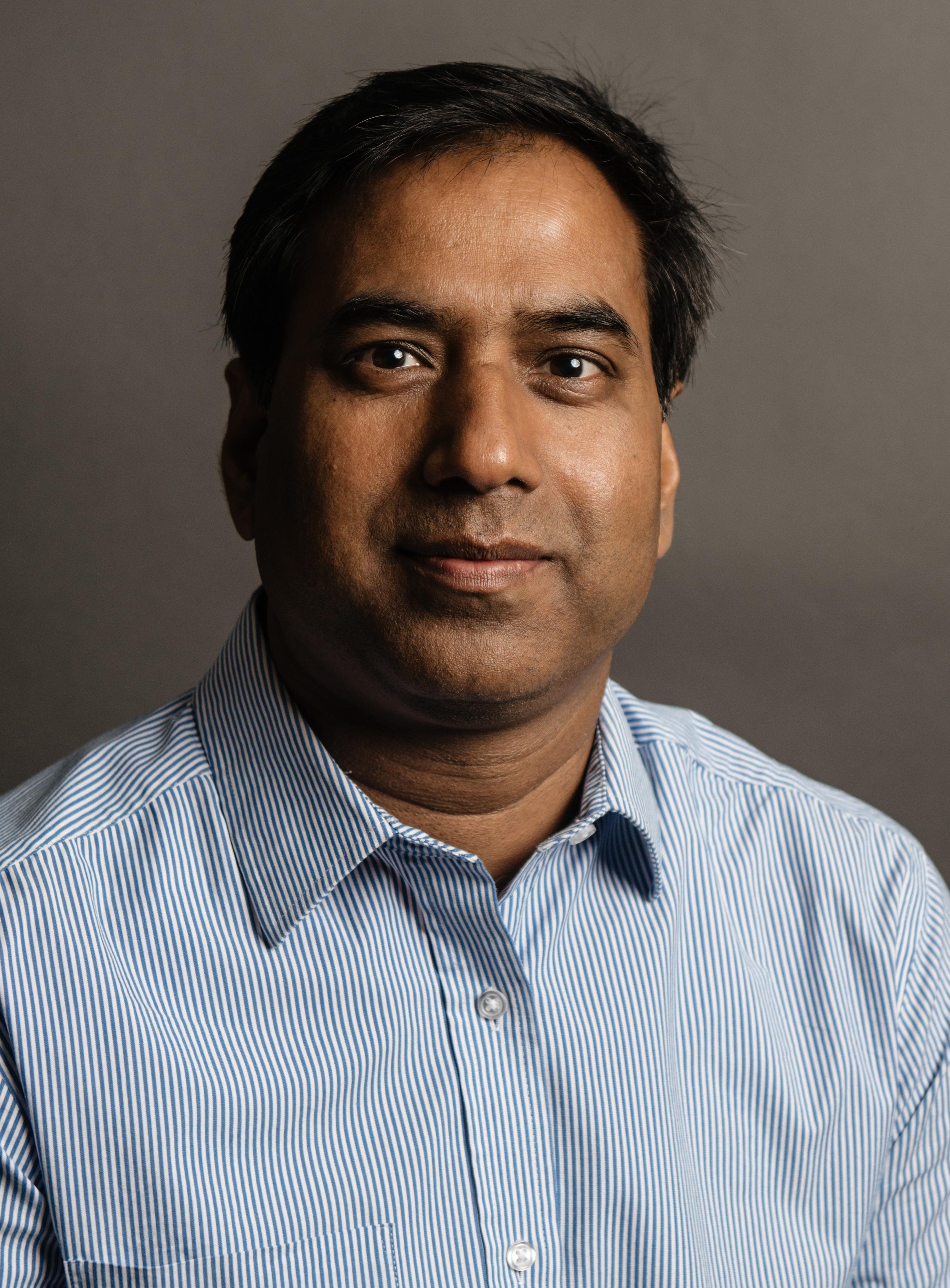 A man posing for a headshot